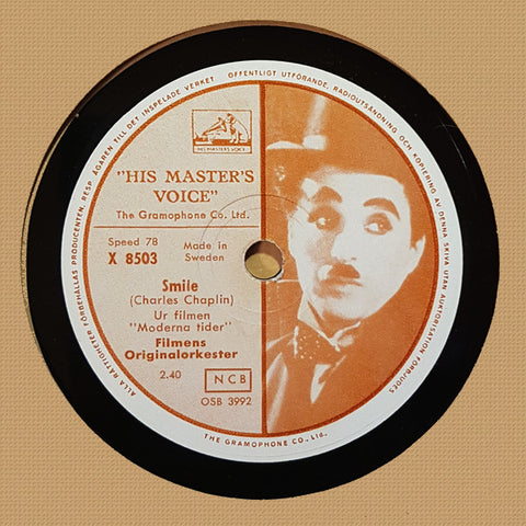 Front cover of Filmens Originalorkester / Charles Chaplin – Smile / Chaplins Manschettvisa, His Master's Voice, Sweden, 1954