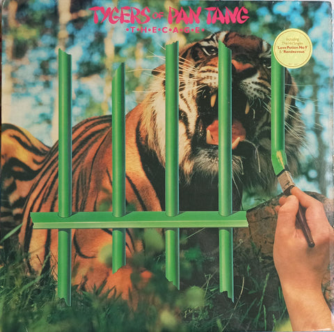 Front cover of Tygers Of Pan Tang – The Cage, MCA Records, UK, 1982